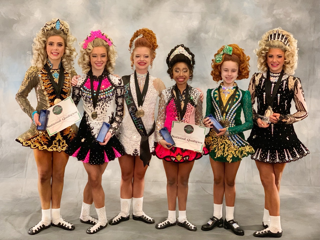 Spirited Soles dancers celebrating competition achievements